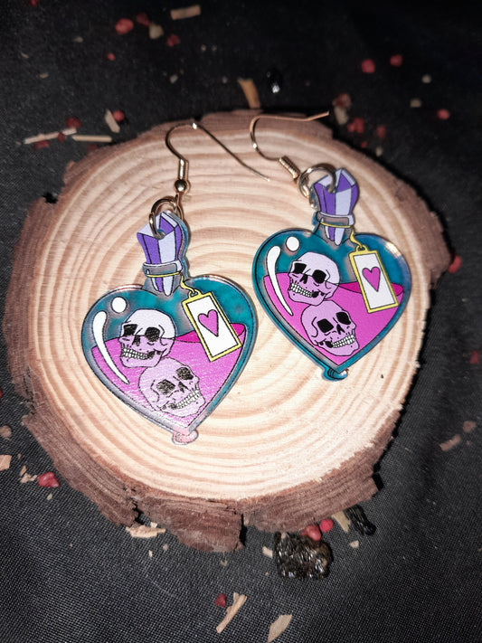 Skull potion bottle earrings